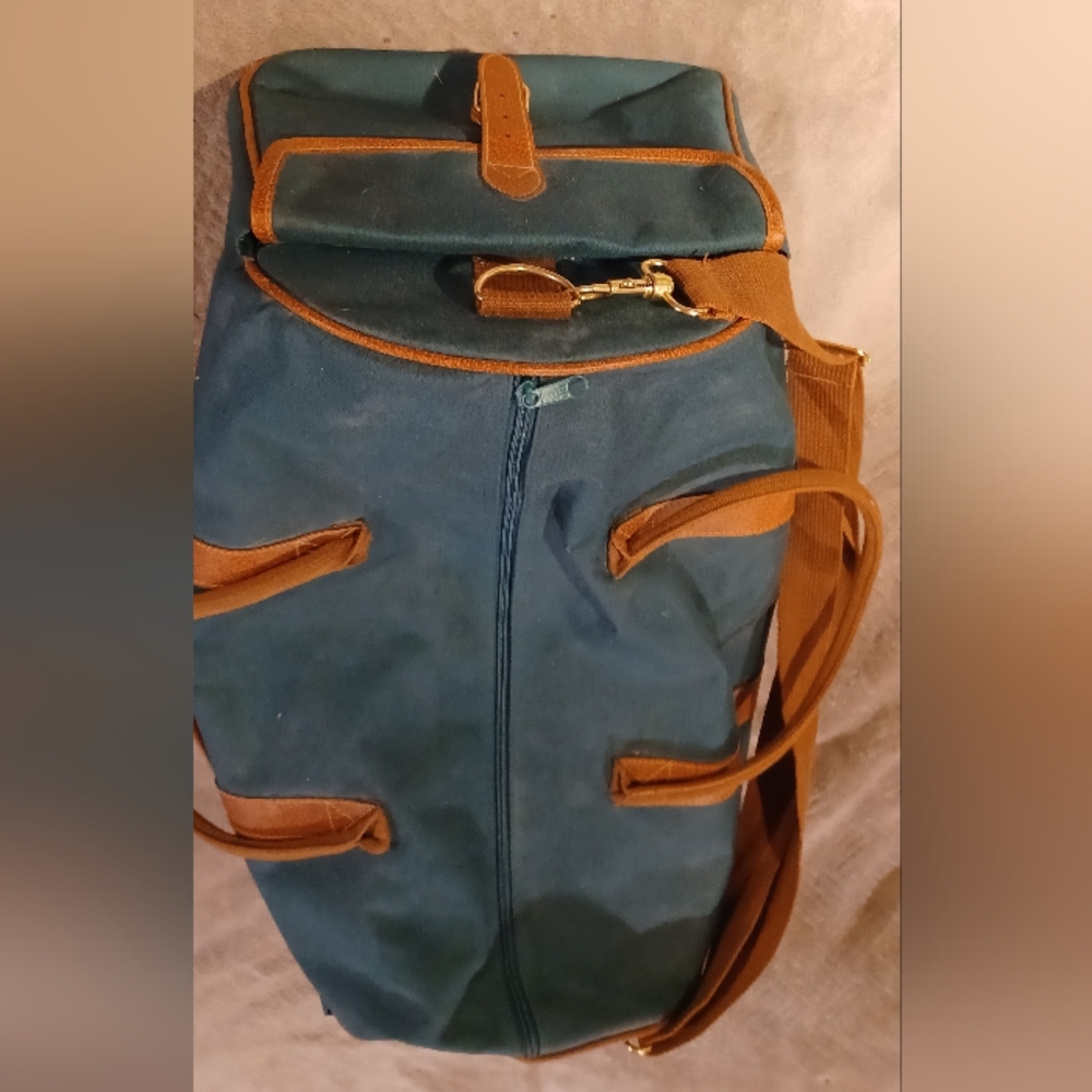 Duffle bag fancy straps are nice accents to this bag